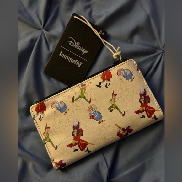 Loungefly Handbags - Loungefly Disney RARE Peter Pan Flap Wallet